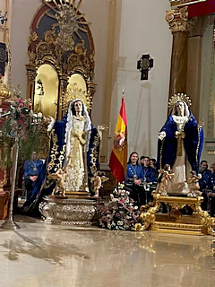 El Almirante del Arsenal de Cartagena impone el fajín a las Vírgenes de los Dolores de Mula y Pliego en un emotivo acto de hermanamiento